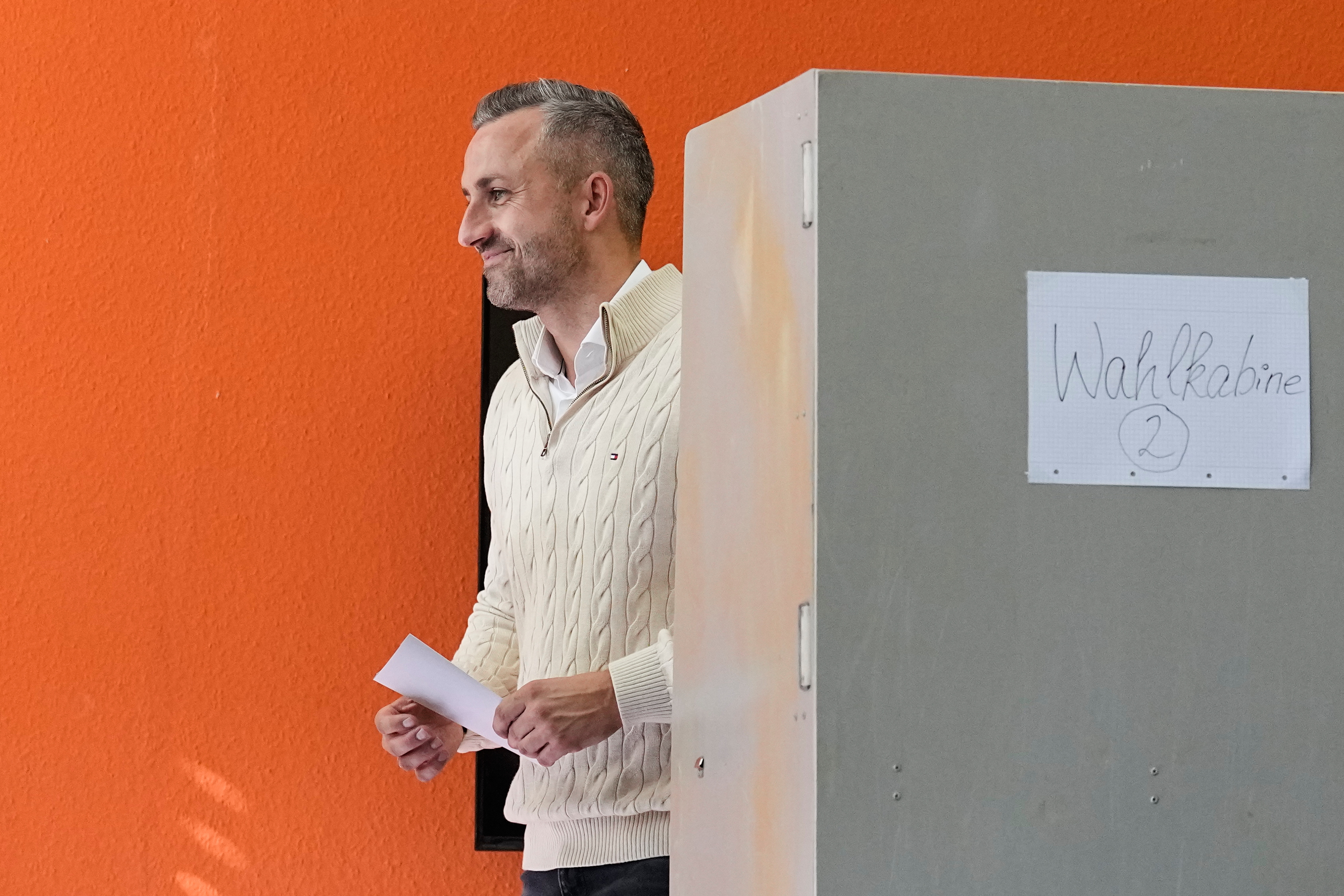 Ulrich Siegmund, top candidate for the "Alternative for Germany" (AfD) party votes at a polling station during the Saxony-Anhalt state elections in Tangermuende, eastern Germany, Sunday, Sept. 6, 2026.